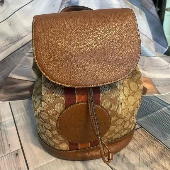 Coach of New York Dempsey Drawstring Backpack Jacquard w/patch & stripe 🔥EUC